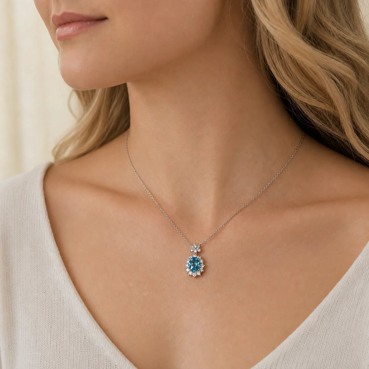 Selunyra Aquamarine D Necklace worn by model, side close-up