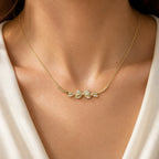 Selunyra Aurora Bow Necklace worn on neck 1