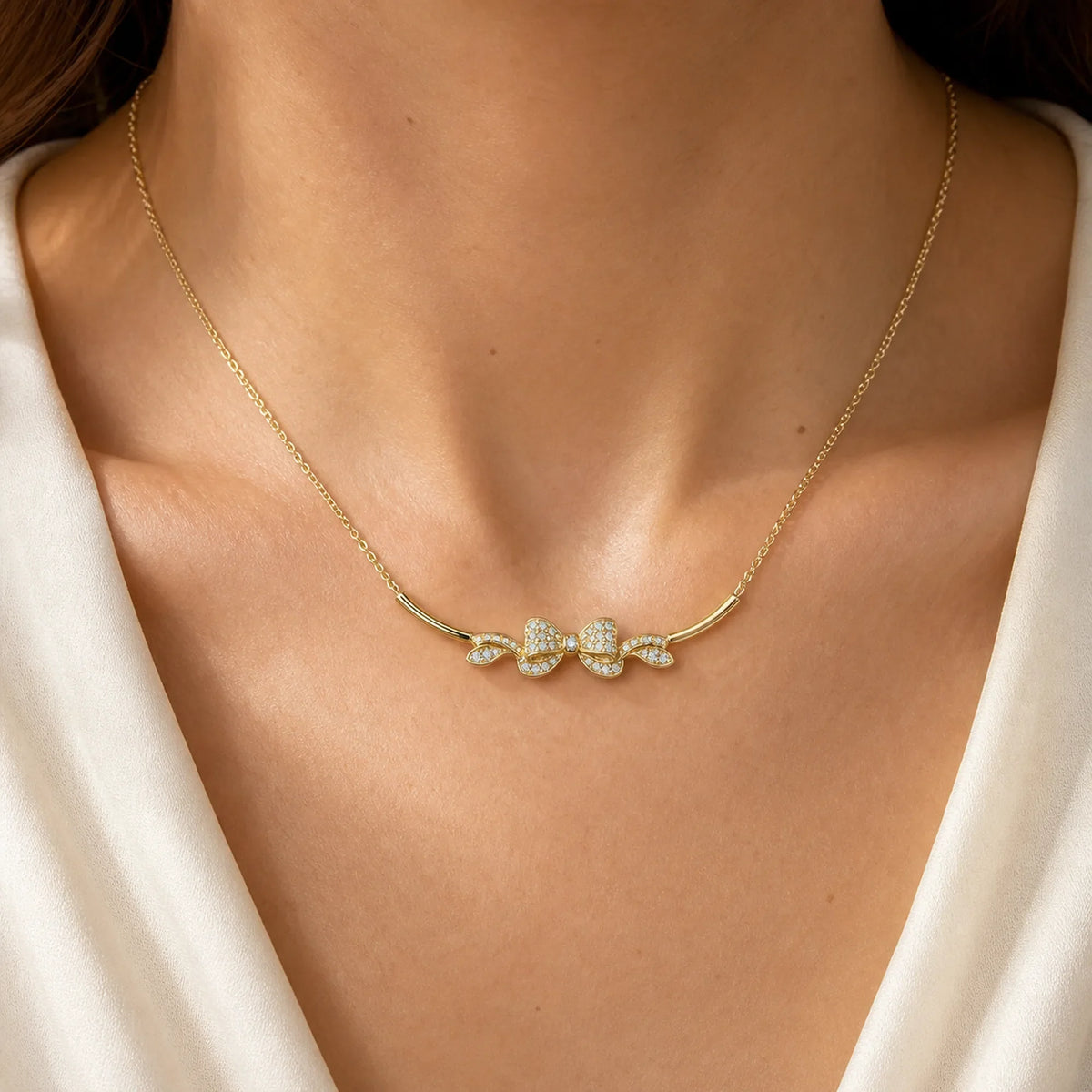 Selunyra Aurora Bow Necklace worn on neck 1