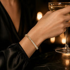 Selunyra gold baguette bracelet worn for evening
