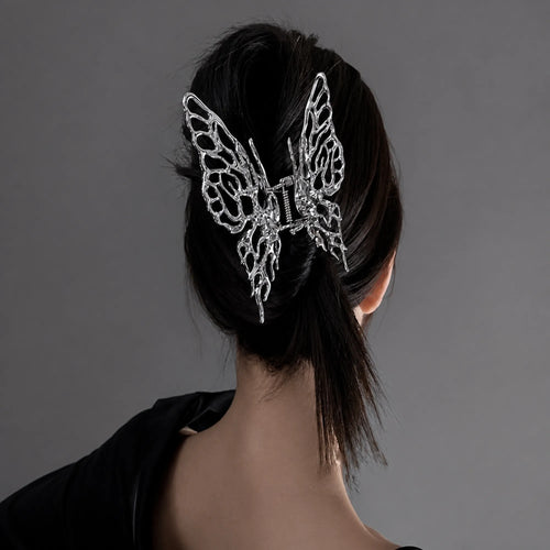 Selunyra Big Butterfly Claw Clip in a black low updo