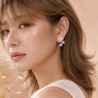 Selunyra Blossom earrings worn close-up