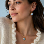 Selunyra Blue Heart necklace and earring set worn by model