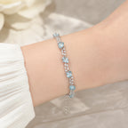 Selunyra Blue Topaz Bracelet worn on wrist