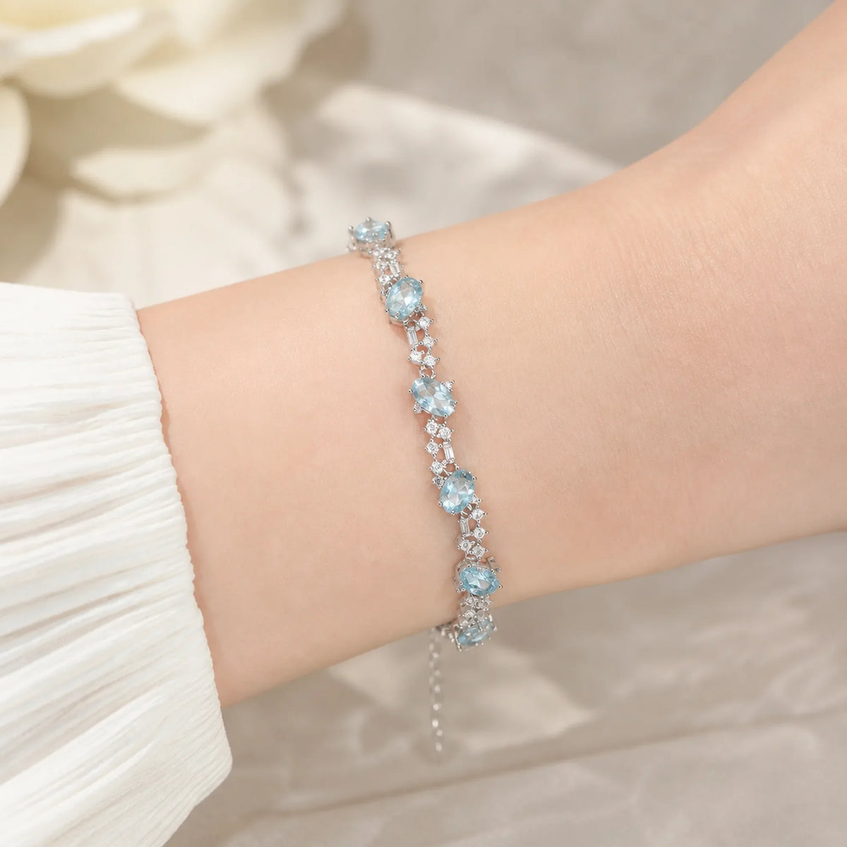 Selunyra Blue Topaz Bracelet worn on wrist