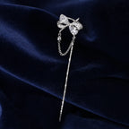 Selunyra silver butterfly bow ear cuff with chain and tassel