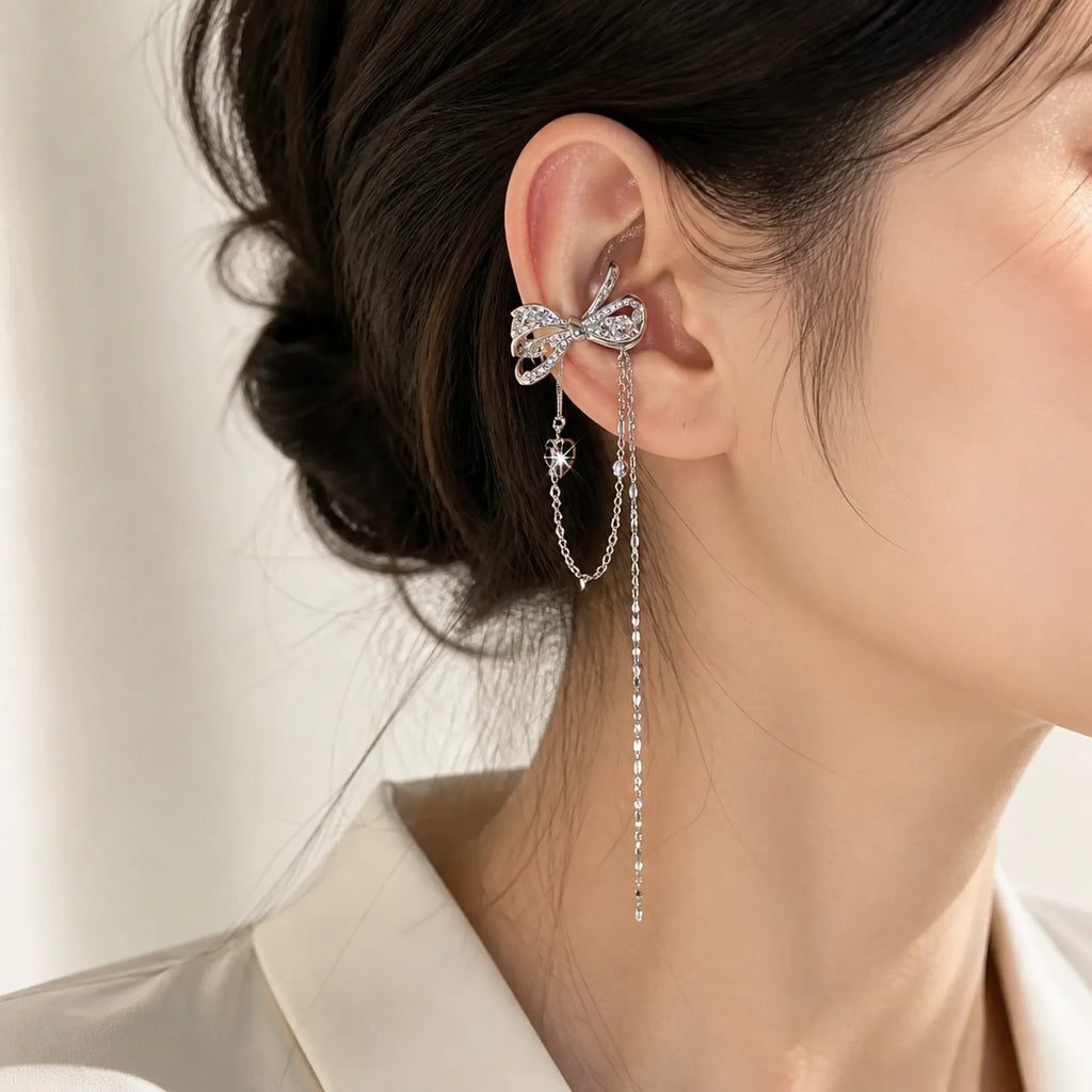 Selunyra butterfly bow ear cuff worn in daylight