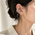 Selunyra butterfly bow ear cuff worn in daylight
