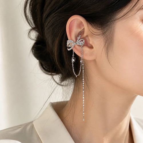 Selunyra butterfly bow ear cuff worn in daylight