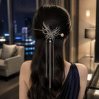 Selunyra black butterfly tassel hair stick worn for evening
