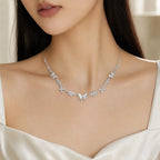 Selunyra Butterfly Necklace worn with ivory satin