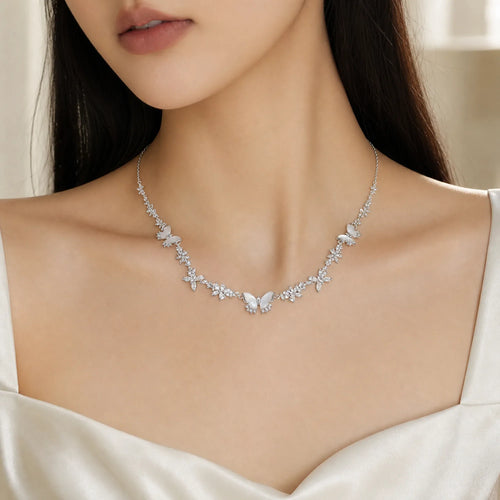Selunyra Butterfly Necklace worn with ivory satin