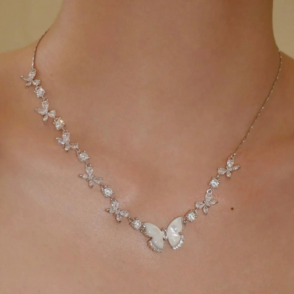 Selunyra Butterfly Necklace Z close wearing view