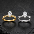Selunyra Chica oval crossover rings in gold and silver