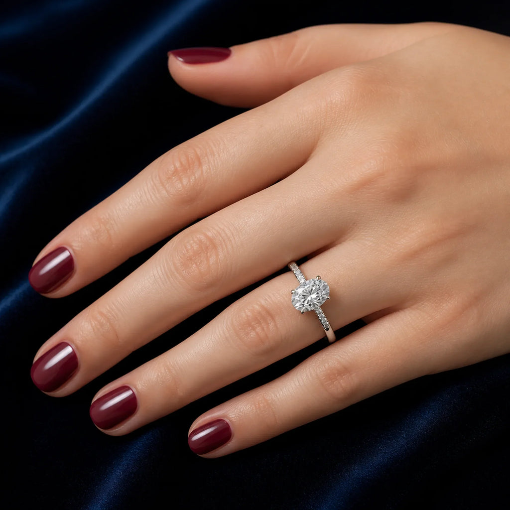 Selunyra silver Chica oval crossover ring worn on hand