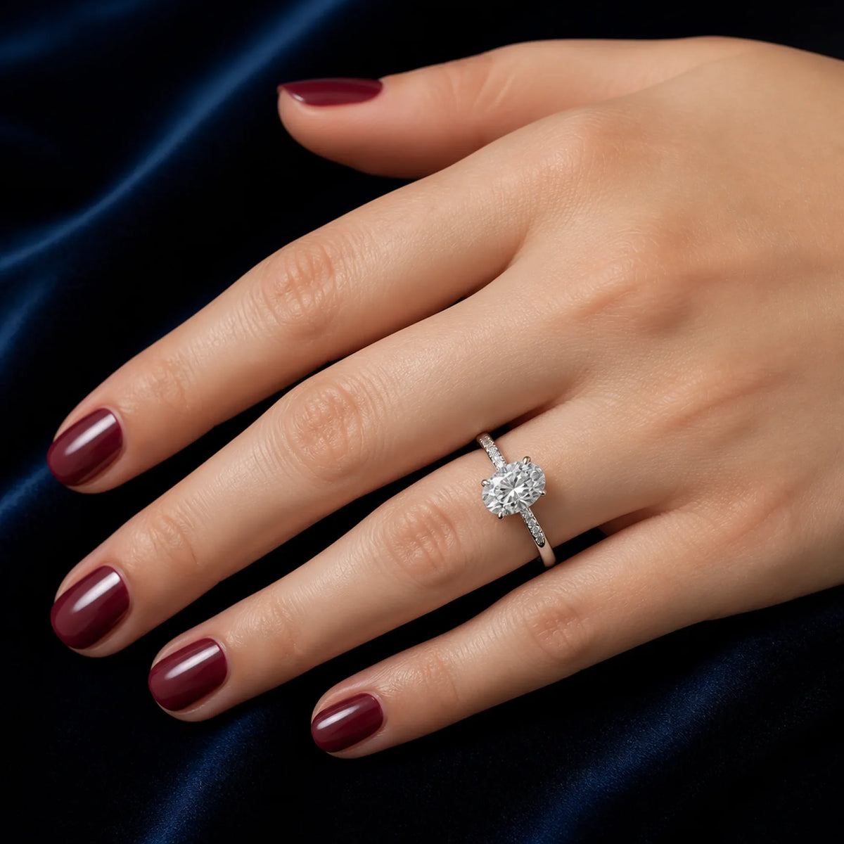 Selunyra silver Chica oval crossover ring worn on hand