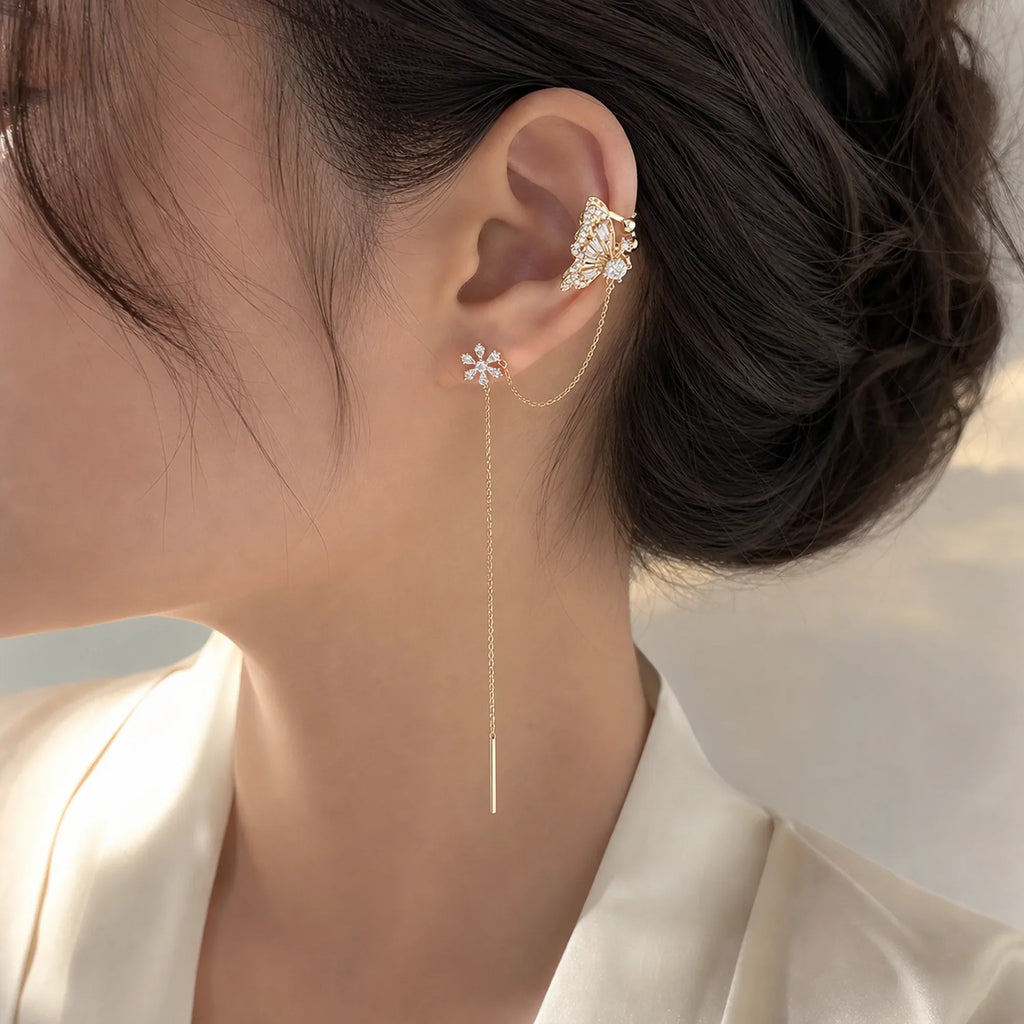 Selunyra butterfly flower chain ear cuff worn in daylight