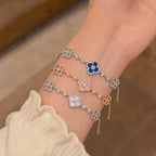 Selunyra Cleef three-piece bracelet set worn together