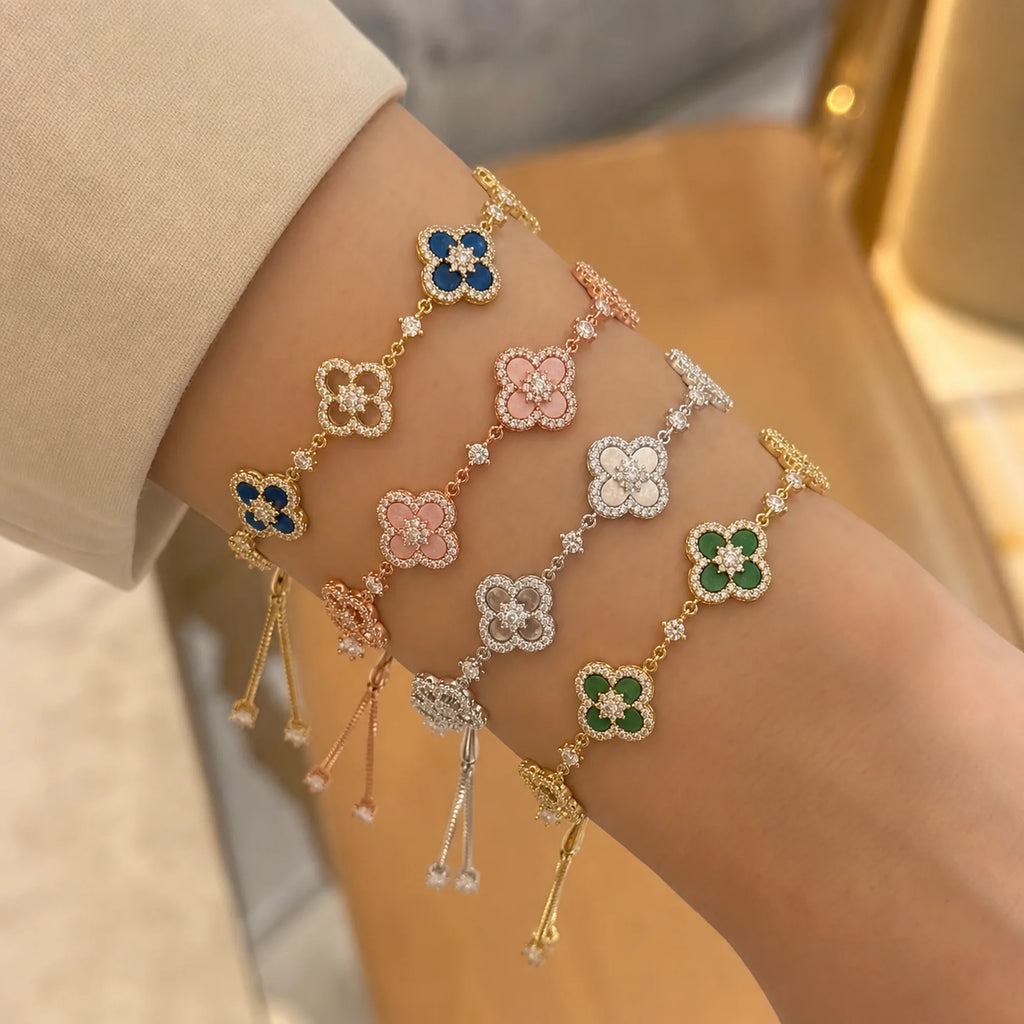 Selunyra Cleef four-piece bracelet set worn together