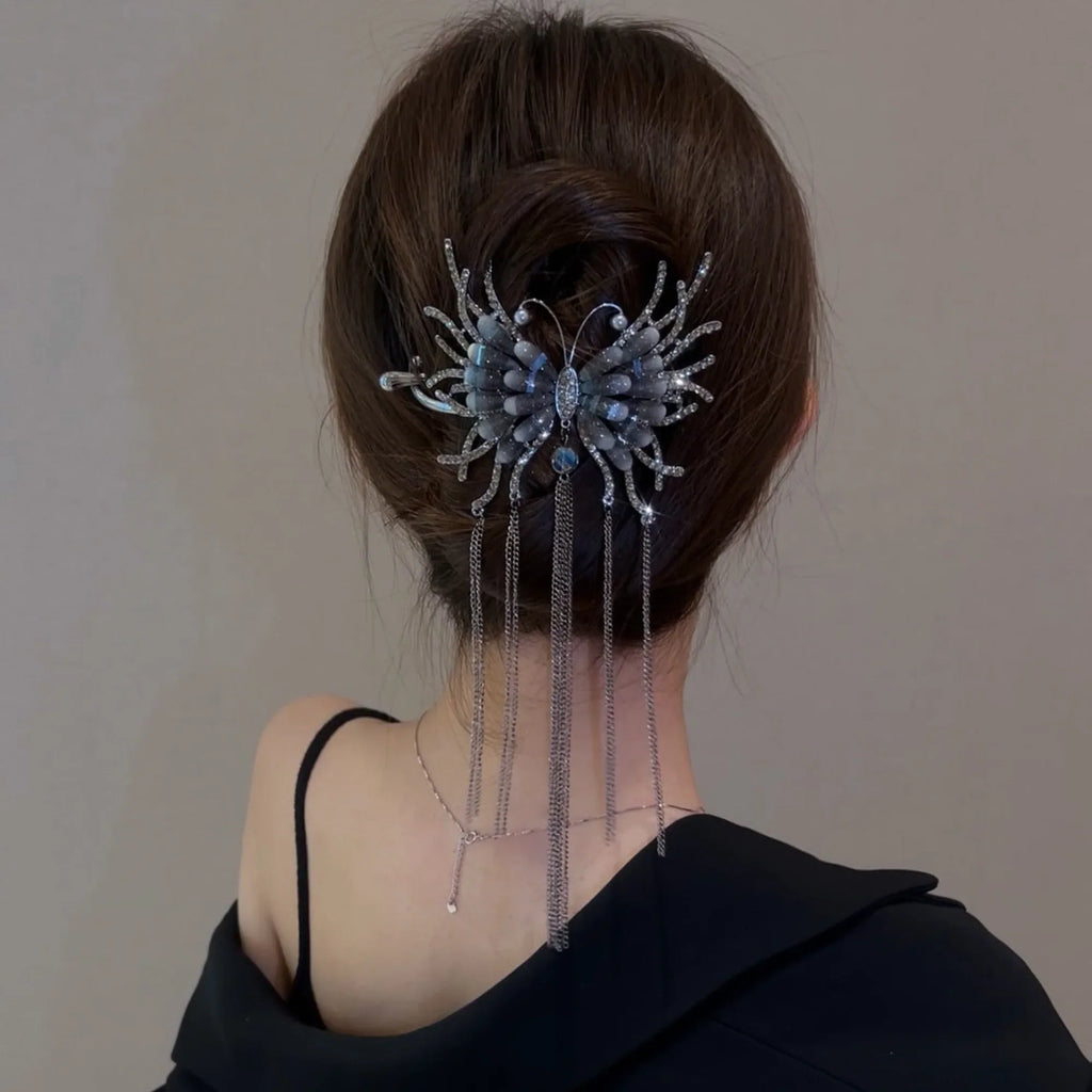 Selunyra dark butterfly tassel hairpin worn with an updo