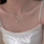 Selunyra S925 Double Butterfly Pendant Stacked Necklace worn close up