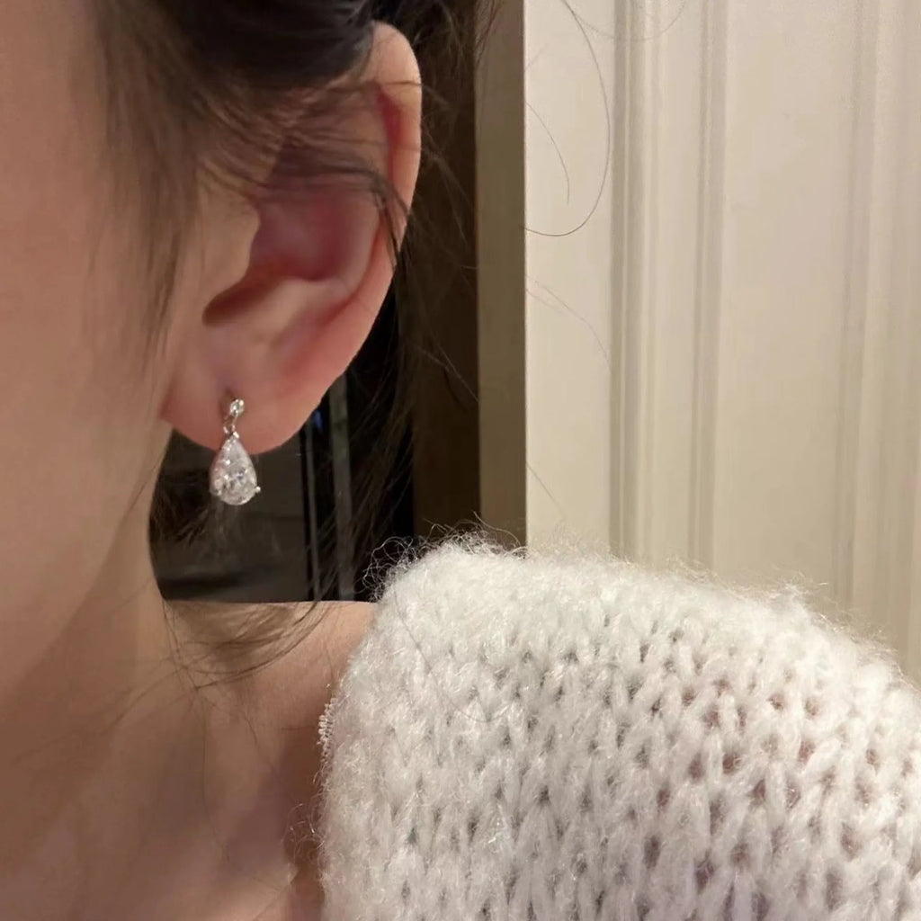 Selunyra Drop Diamond Set earrings worn