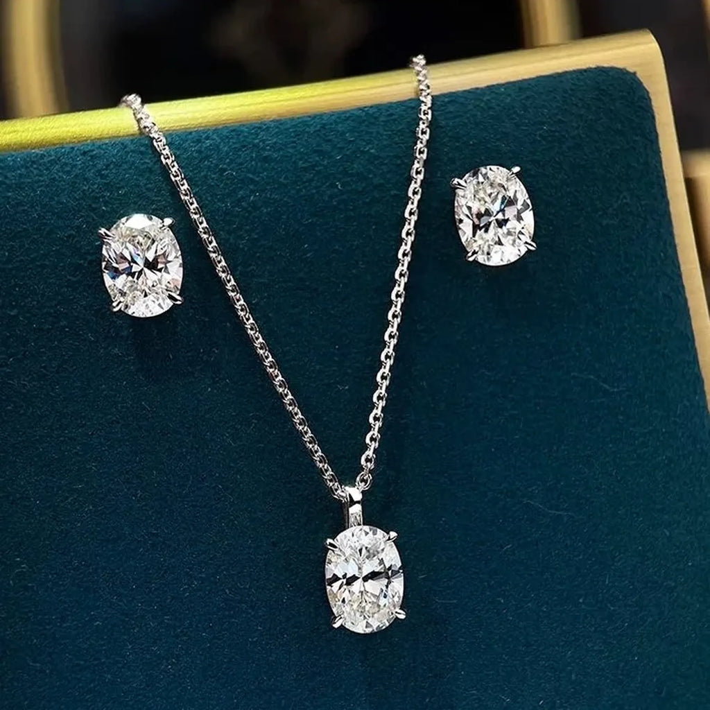 Selunyra Elena oval solitaire necklace and earring set in silver