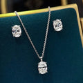 Selunyra Elena oval solitaire necklace and earring set in silver