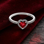 Selunyra silver elevated red heart ring on burgundy velvet