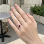 Selunyra elevated red heart ring worn in daylight