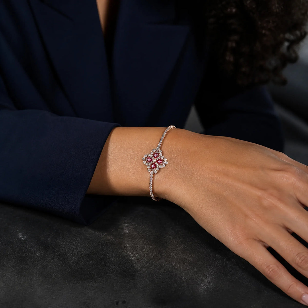 Selunyra Elisa bracelet worn with navy blazer
