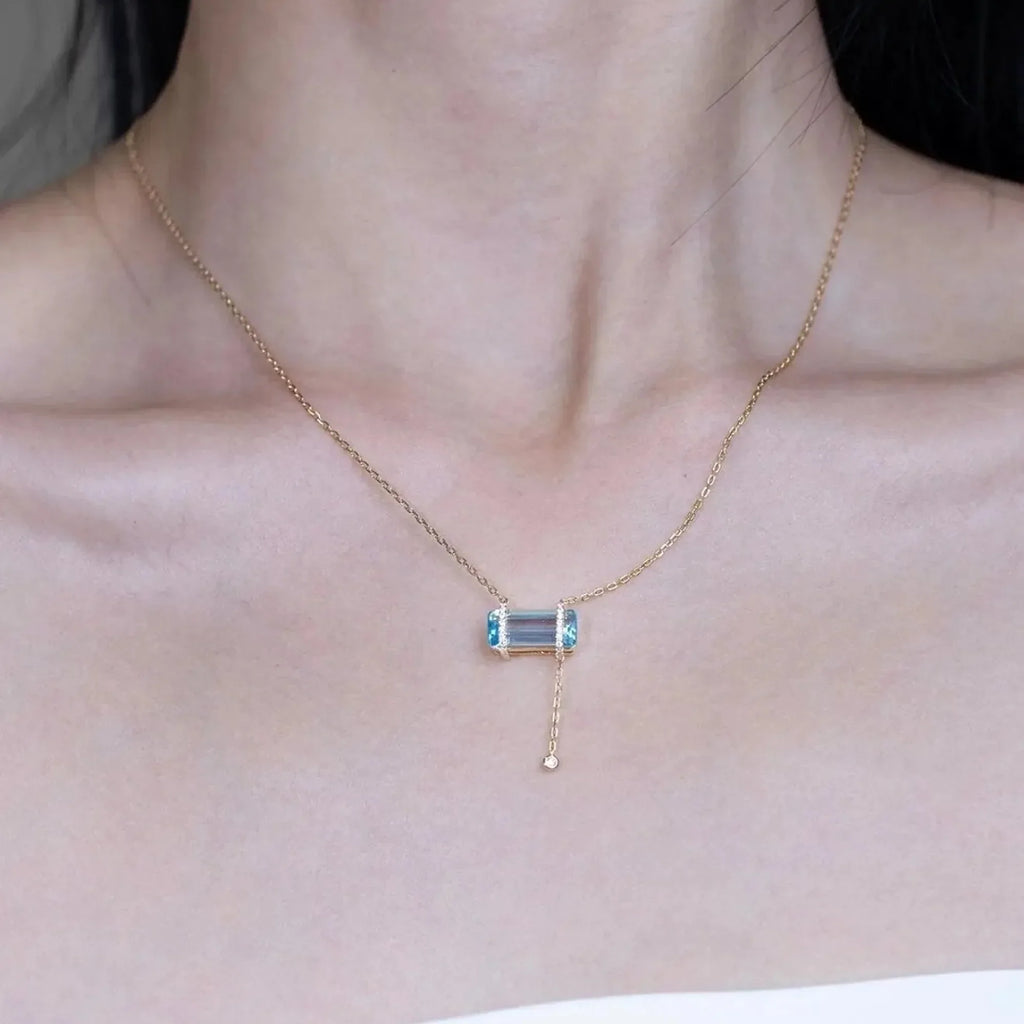 Selunyra Elsa Necklace worn by model, close-up