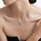 Selunyra Emerald Cut Blue D Necklace model close-up