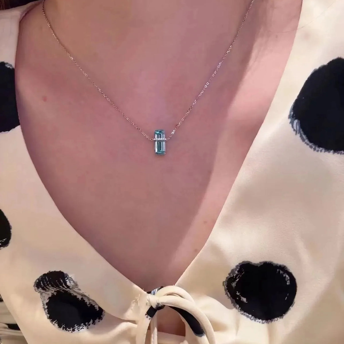 Selunyra Emerald Cut Blue D Necklace with polka-dot top