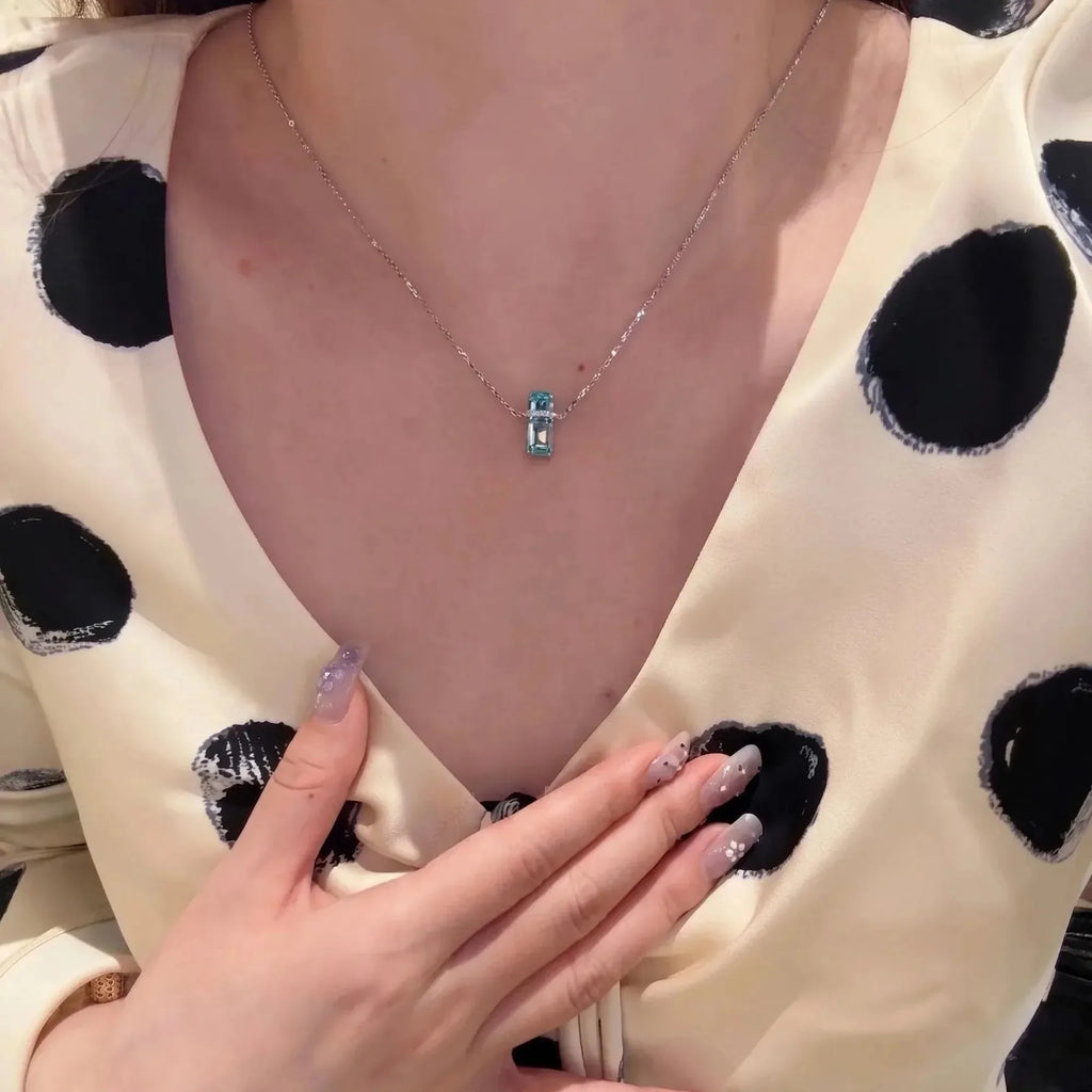 Selunyra Emerald Cut Blue D Necklace front view