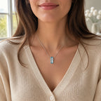 Selunyra Emerald Cut Blue D Necklace worn by model, lifestyle view