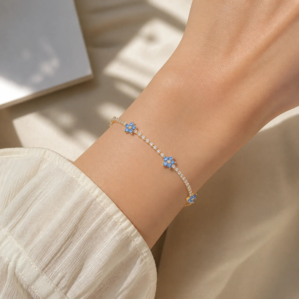 Selunyra blue Flower Tennis Bracelet worn on wrist