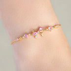 Selunyra Friendship Bracelet in gold worn on wrist