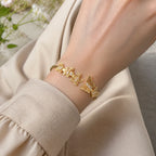 Selunyra Gold Butterfly Bracelet worn in soft daylight