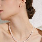 Selunyra Goria 8mm pearl necklace worn with an updo