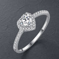 Selunyra silver heart halo ring on charcoal slate