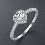 Selunyra silver heart halo ring on charcoal slate