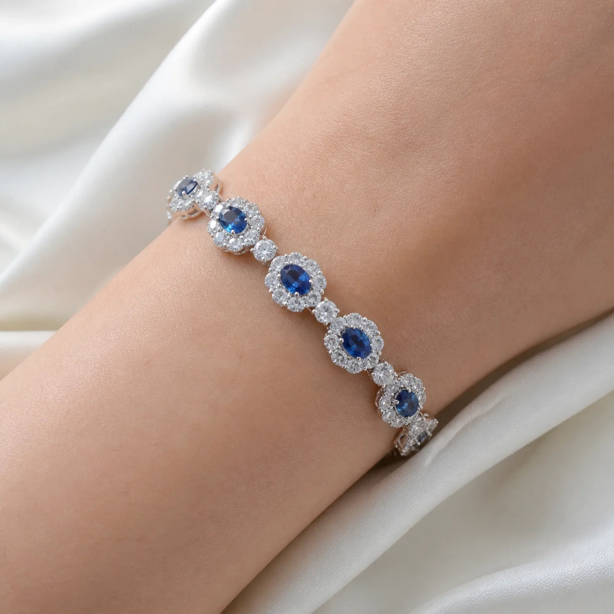 Selunyra Ice Blue Flower Bracelet worn on wrist 1