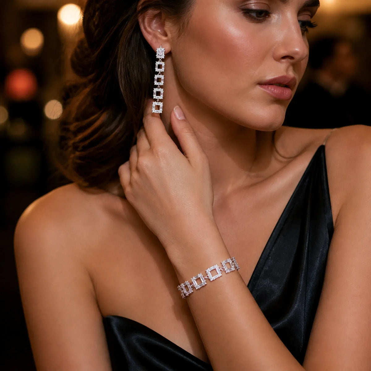 Selunyra Louisa bracelet and drop earring worn for evening