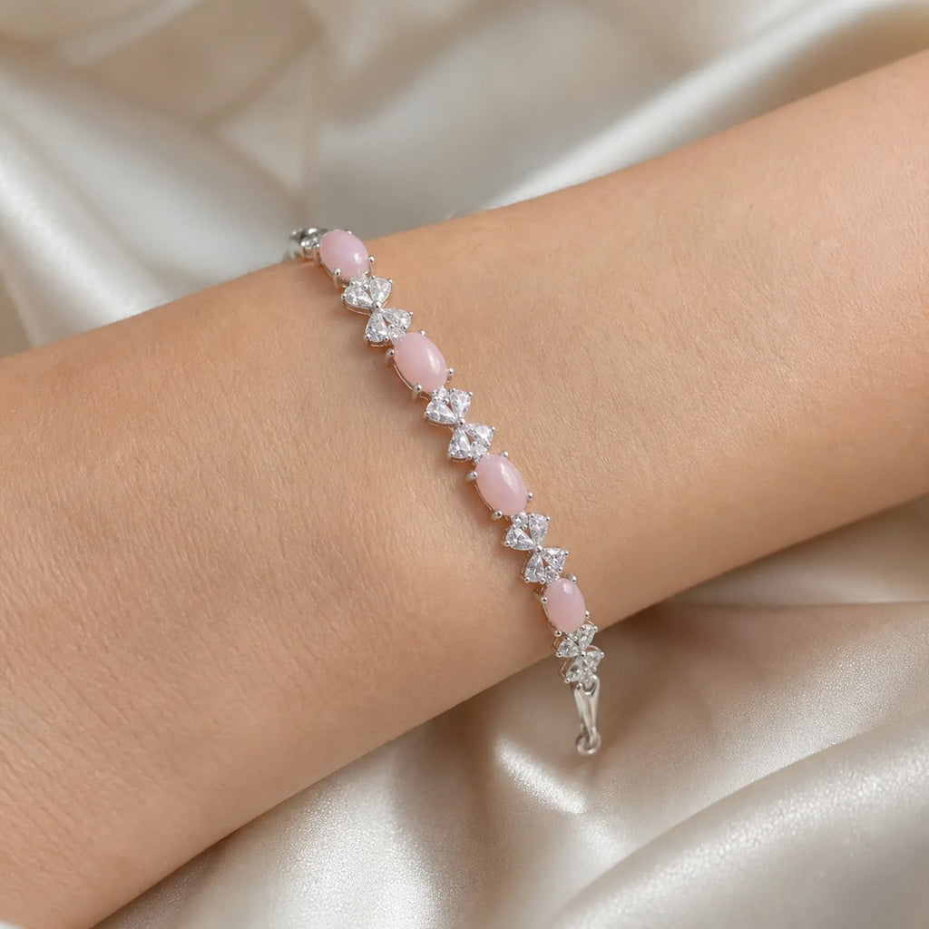 Selunyra Natural Pink Opal Bow Bracelet worn on wrist 1