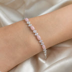 Selunyra Natural Pink Opal Bow Bracelet worn on wrist 1