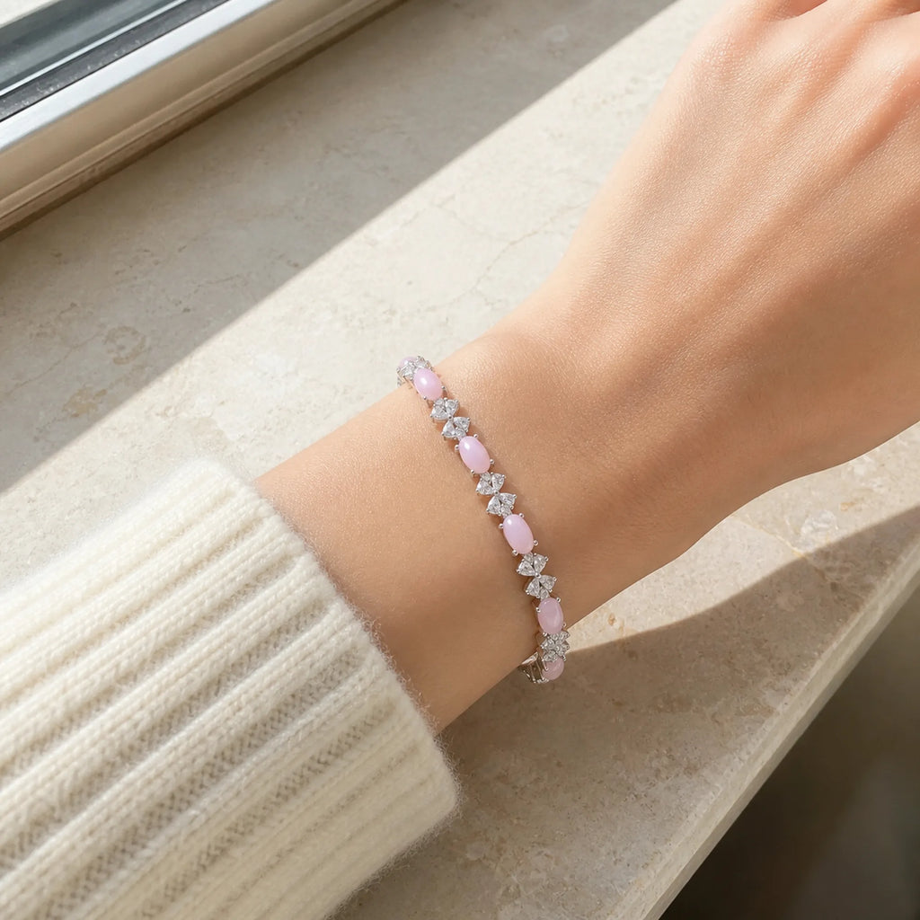 Selunyra Natural Pink Opal Bow Bracelet worn on wrist 2