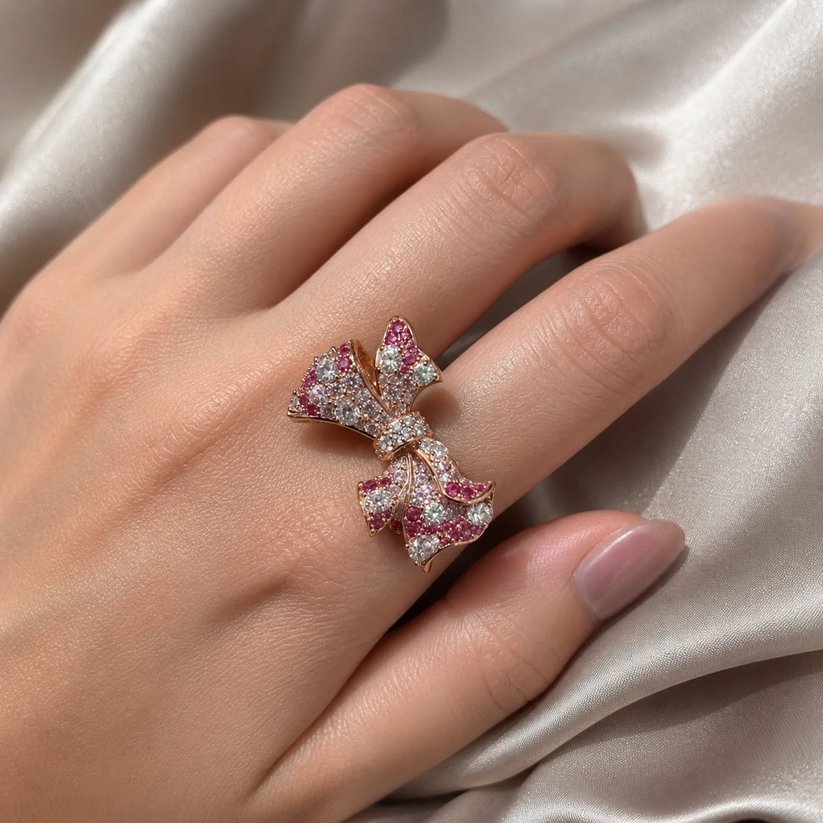 Selunyra Pink Bow Ring worn on hand 1