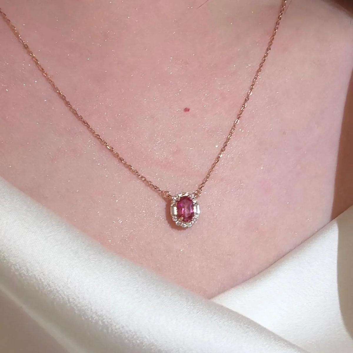 Selunyra Pink Sapphire Necklace worn at collarbone