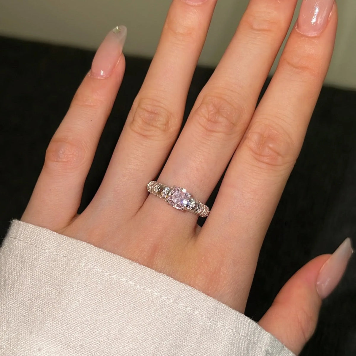 Selunyra pink oval ring worn close-up